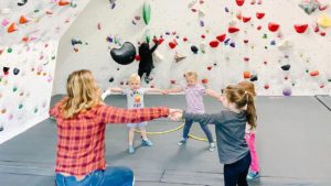 our sprouts on route youthing climbing program teach kids as early as 3 how to move and climb with fun games for kids, engaging physical activies and introduction to climbing basics